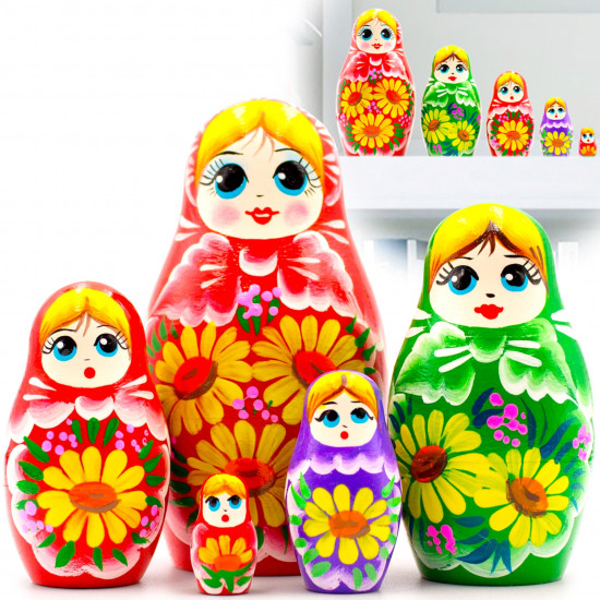Matryoshka with a bouquet of yellow gerberas