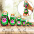 Matryoshka Nesting Dolls in Green Head Scarf and Sarafan with Pink Rose Decorations Set of 7 pcs