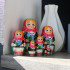 Belarusian matryoshka with blue cornflowers in folk dress with ornament set of 7 pieces