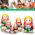 Belarusian matryoshka with blue cornflowers in folk dress with ornament set of 7 pieces