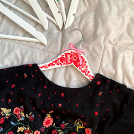 White Clothes Hanger with Red Flowers
