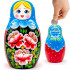 Matryoshka piggy bank in a blue headscarf and sarafan with roses - Wooden Money Bank