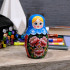 Matryoshka piggy bank in a blue headscarf and sarafan with roses - Wooden Money Bank