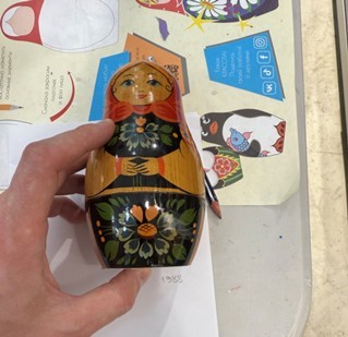 Handmade nesting dolls and decorative boxes